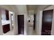 Hallway with access to kitchen and other rooms at 309 Elm St, Marshville, NC 28103