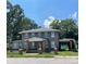Brick two-story house with a front porch and attached carport at 309 Elm St, Marshville, NC 28103