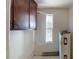 Small bathroom with water heater at 309 Elm St, Marshville, NC 28103