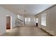 Dining room with hardwood floors and staircase access at 309 Elm St, Marshville, NC 28103
