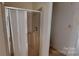 Small bathroom with shower stall at 309 Elm St, Marshville, NC 28103