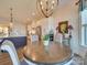 Kitchen with an island and round dining table at 82220 Standing Oak Dr, Charlotte, NC 28278