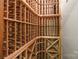 Custom-built wine cellar with ample storage for wine bottles at 10320 Berkeley Pond Dr, Charlotte, NC 28277