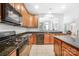 Spacious kitchen featuring granite countertops and modern appliances at 10320 Berkeley Pond Dr, Charlotte, NC 28277