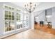 Breakfast nook showcasing hardwood floors and views of the backyard at 10320 Berkeley Pond Dr, Charlotte, NC 28277