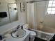 Clean bathroom with shower/tub combo, vanity, and window at 916 Mcalway Rd # D, Charlotte, NC 28211