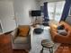Living room with hardwood floors and comfy seating at 916 Mcalway Rd # D, Charlotte, NC 28211