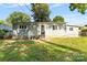 Rear view of a single-story house with gray siding at 2409 Thornton Rd, Charlotte, NC 28208