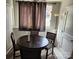 Small dining area with a round table and four chairs at 910 Mcalway Rd # A, Charlotte, NC 28211