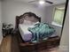 Bedroom with a large bed and nightstand at 910 Mcalway Rd # A, Charlotte, NC 28211