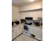 Kitchen with white cabinets and speckled countertops at 910 Mcalway Rd # A, Charlotte, NC 28211