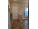 Bright entryway with tile flooring and staircase at 7945 Mariners Pointe Cir, Denver, NC 28037