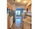 Bright kitchen with stainless steel appliances and ample cabinetry at 7945 Mariners Pointe Cir, Denver, NC 28037