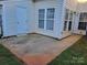 Small concrete patio adjacent to exterior door at 7945 Mariners Pointe Cir, Denver, NC 28037