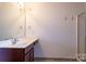 Bathroom with a vanity, mirror, and shower at 9816 Cayenne Dr, Charlotte, NC 28214