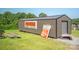Metal storage shed with vintage signage at 5067 E Dixon Blvd, Kings Mountain, NC 28086