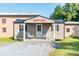 Small office building with a porch and rocking chairs at 5067 E Dixon Blvd, Kings Mountain, NC 28086