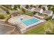 Community pool with plenty of lounge chairs at 4493 Haddington Dr # 154, Fort Mill, SC 29707