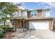 Two-story house with stone and wood siding, a covered porch, and a two-car garage at 4493 Haddington Dr # 154, Fort Mill, SC 29707