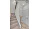 Modern staircase with wood railing and carpeted steps at 5151 Tommy Ln # 1103, Stanley, NC 28164