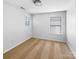 Cozy carpeted bedroom with two windows and neutral walls at 10305 Shrader Nw St, Concord, NC 28027