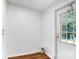 Laundry area with exterior door and vinyl flooring at 5735 High Plains Ct, Iron Station, NC 28080