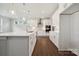 Open concept kitchen with white cabinets and large island at 3192 Timber Run Ln, Maiden, NC 28650