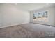 Bright bedroom with carpet flooring and large window at 3192 Timber Run Ln, Maiden, NC 28650