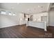 Modern kitchen with white cabinets and island at 3192 Timber Run Ln, Maiden, NC 28650