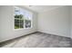 Spacious bedroom with large window and carpet at 3192 Timber Run Ln, Maiden, NC 28650