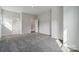 Well-lit bedroom with carpet, ensuite bathroom access, and walk-in closet at 3192 Timber Run Ln, Maiden, NC 28650