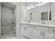 Double vanity bathroom with white cabinets at 3192 Timber Run Ln, Maiden, NC 28650