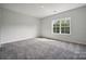 Charming bedroom with carpet and a window view at 3192 Timber Run Ln, Maiden, NC 28650