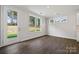 Bright dining room with hardwood floors and backyard view at 3192 Timber Run Ln, Maiden, NC 28650