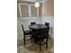 Small breakfast nook with a round table and four chairs at 304 Palmer St, Albemarle, NC 28001