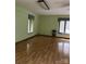 Spacious bonus room with hardwood floors and multiple windows at 106 Dons Ct, Shelby, NC 28150