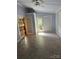 Bright sunroom featuring tile floors and French doors leading outside at 106 Dons Ct, Shelby, NC 28150