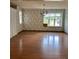 Dining room featuring hardwood floors and floral wallpaper at 106 Dons Ct, Shelby, NC 28150