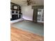Living room featuring hardwood floors and a brick fireplace at 106 Dons Ct, Shelby, NC 28150