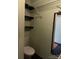 Small bathroom with toilet and shelving at 106 Dons Ct, Shelby, NC 28150