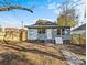 Private backyard with a fenced area and a concrete patio at 4319 Hovis Rd, Charlotte, NC 28208