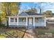 Charming craftsman home with a newly renovated exterior and a welcoming front porch at 4319 Hovis Rd, Charlotte, NC 28208