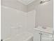 Clean bathroom with white fixtures and a shower/tub at 4319 Hovis Rd, Charlotte, NC 28208