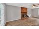 Spacious living room with a brick fireplace and hardwood flooring at 511 Colorado Trl, Lincolnton, NC 28092