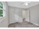 Bedroom with double-door closet and wood-look floors at 511 Colorado Trl, Lincolnton, NC 28092