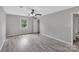 Bedroom with ceiling fan and wood-look floors at 511 Colorado Trl, Lincolnton, NC 28092
