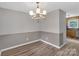 View of dining room, kitchen, and hardwood floors at 511 Colorado Trl, Lincolnton, NC 28092