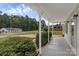 Inviting front porch with ample space, showcasing a well-maintained home and surrounding landscape at 511 Colorado Trl, Lincolnton, NC 28092