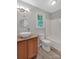 Bathroom with wood vanity, vessel sink, and bathtub at 511 Colorado Trl, Lincolnton, NC 28092