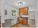 Eat-in kitchen with wood cabinets, a breakfast bar, and ample counter space at 511 Colorado Trl, Lincolnton, NC 28092